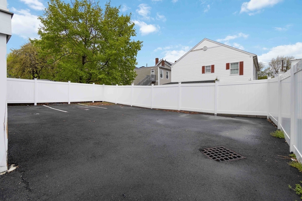 18 Albion Street, Unit 2 Boston, MA 02119 - Photo 21 of 22 a view of a back yard of the house