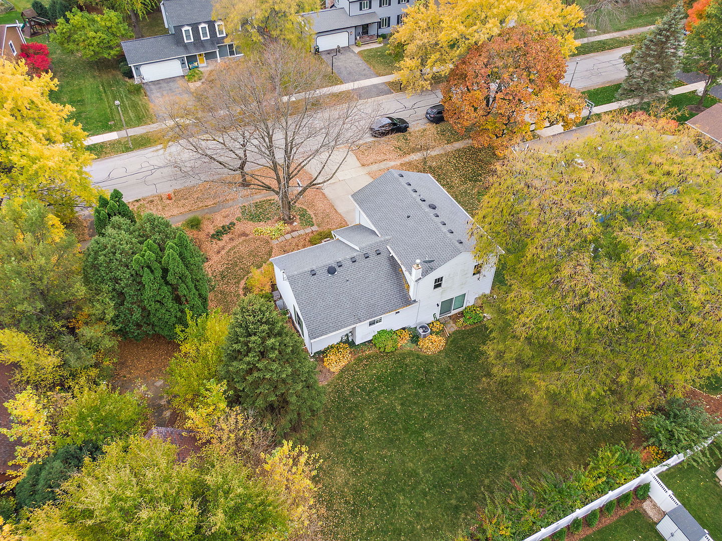 517 Sheffield Road Naperville, IL 60565 - Photo 25 of 29 an aerial view of a house with a yard and garden