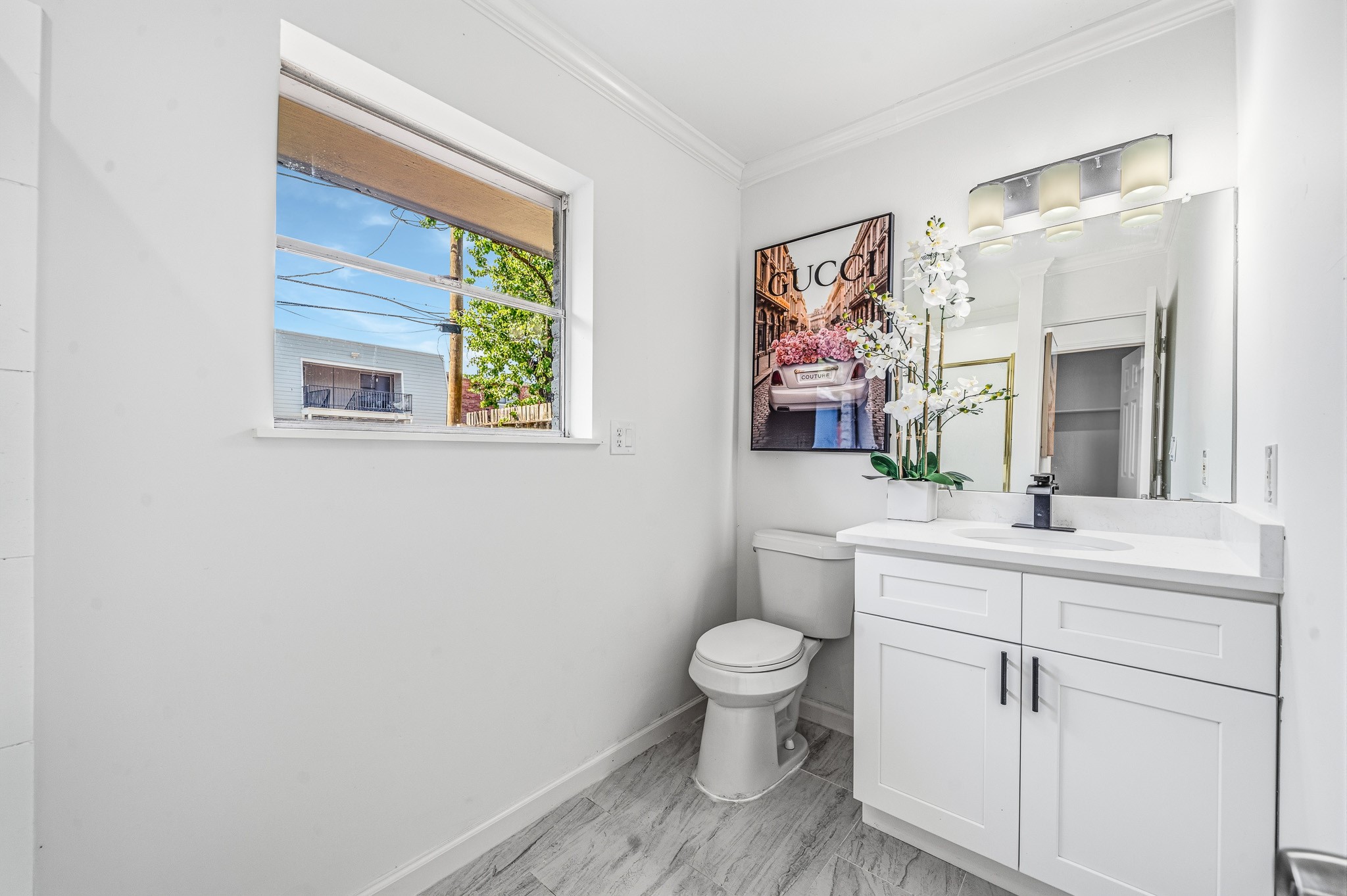 111 Princess Drive Houston, TX 77034 - Photo 23 of 30 a spacious bathroom with a toilet sink and mirror