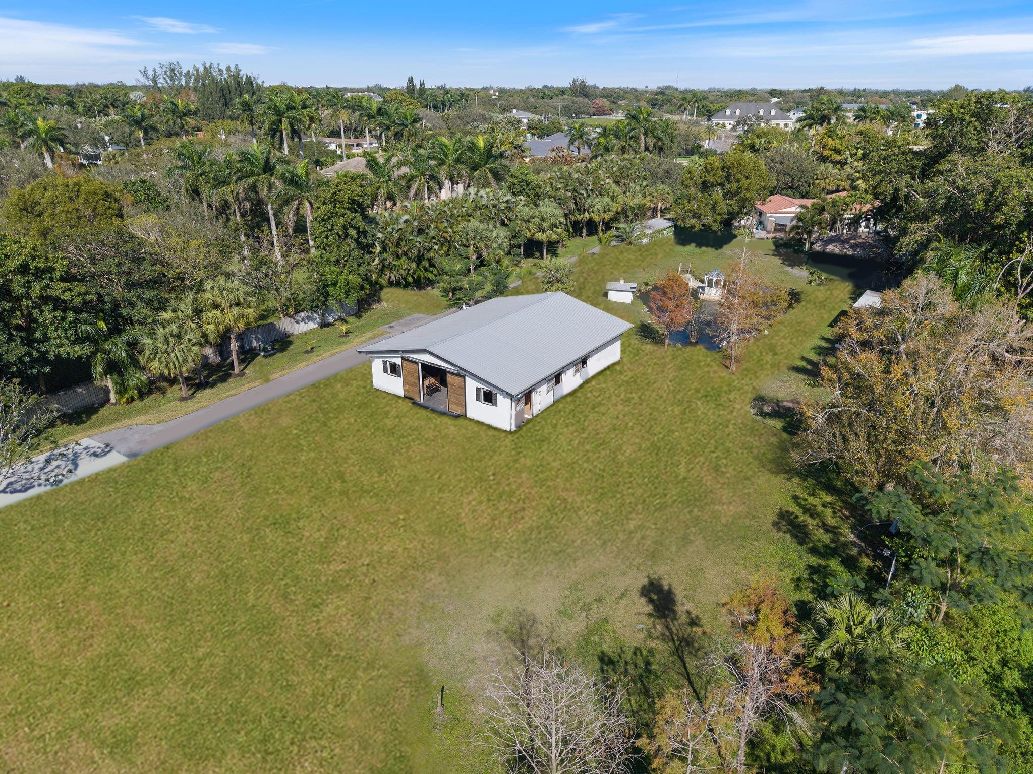 13500 Stirling Road Southwest Ranches, FL 33330 - Photo 86 of 87 AI ENCHANCED - REMOVING FENCING.