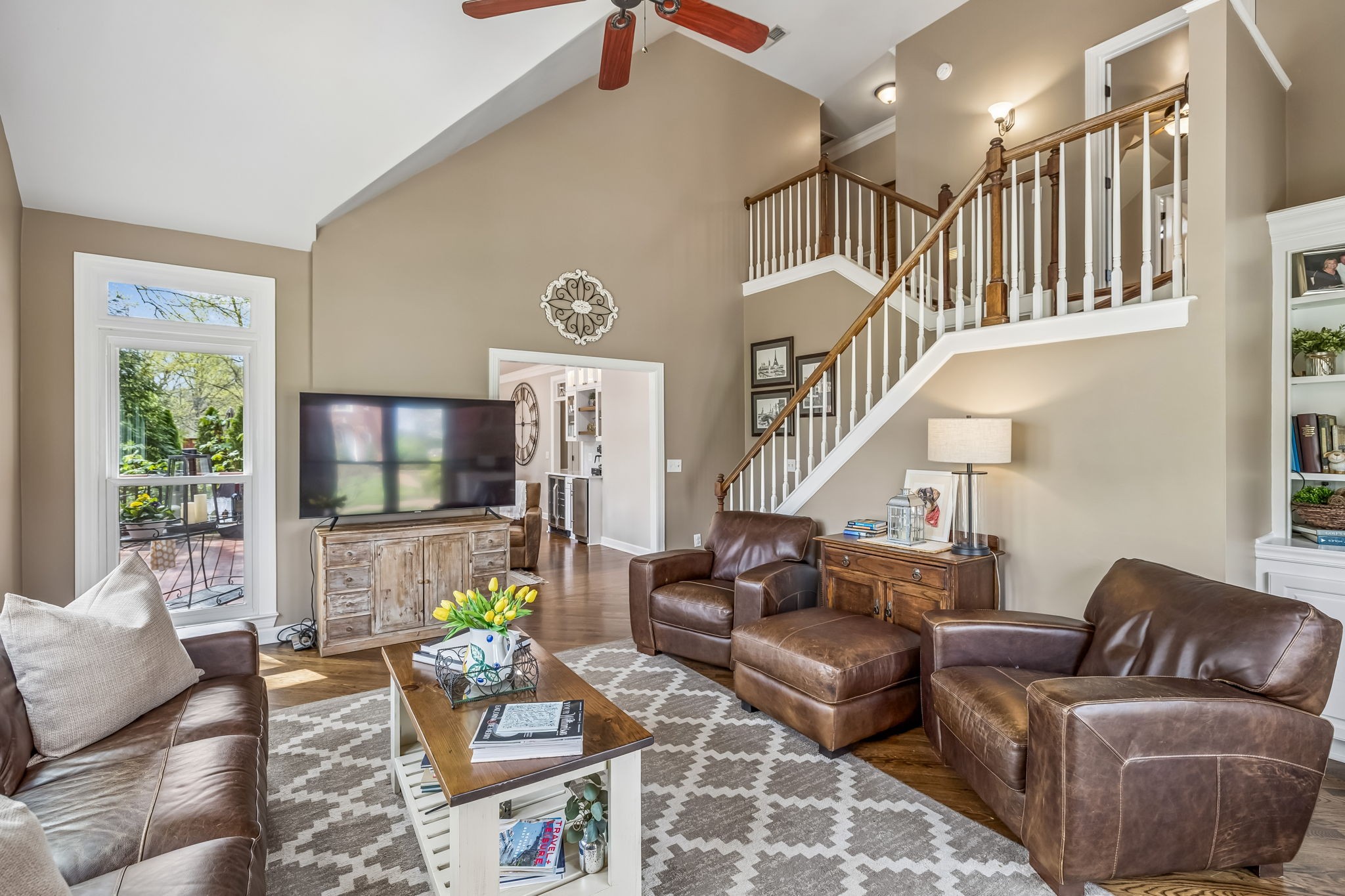 208 Landon Court Franklin, TN 37064 - Photo 22 of 58 a living room with furniture and a flat screen tv