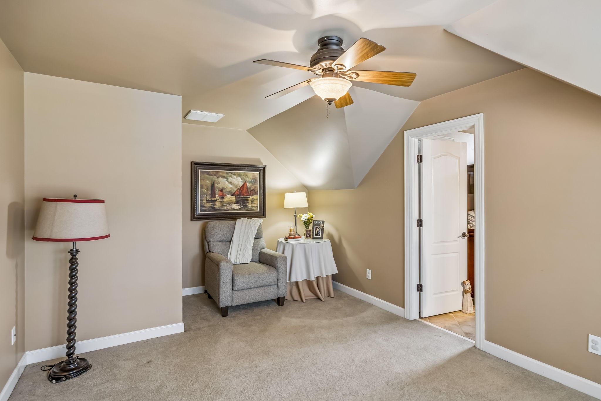 208 Landon Court Franklin, TN 37064 - Photo 23 of 58 a bedroom with a bed and a chandelier