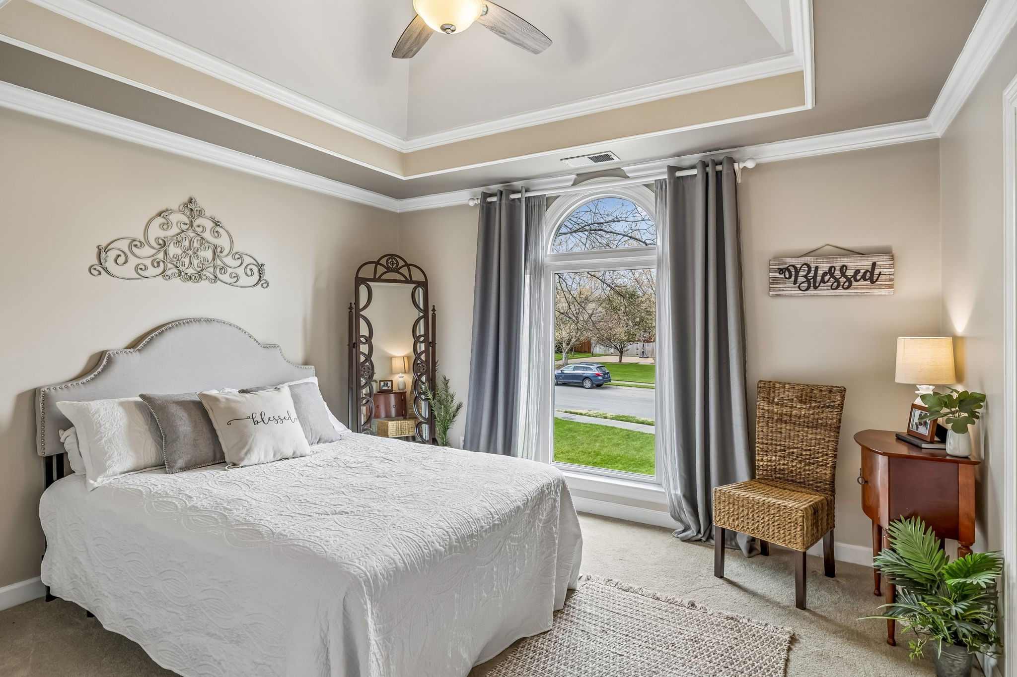 208 Landon Court Franklin, TN 37064 - Photo 27 of 58 a bedroom with a large bed and a large window