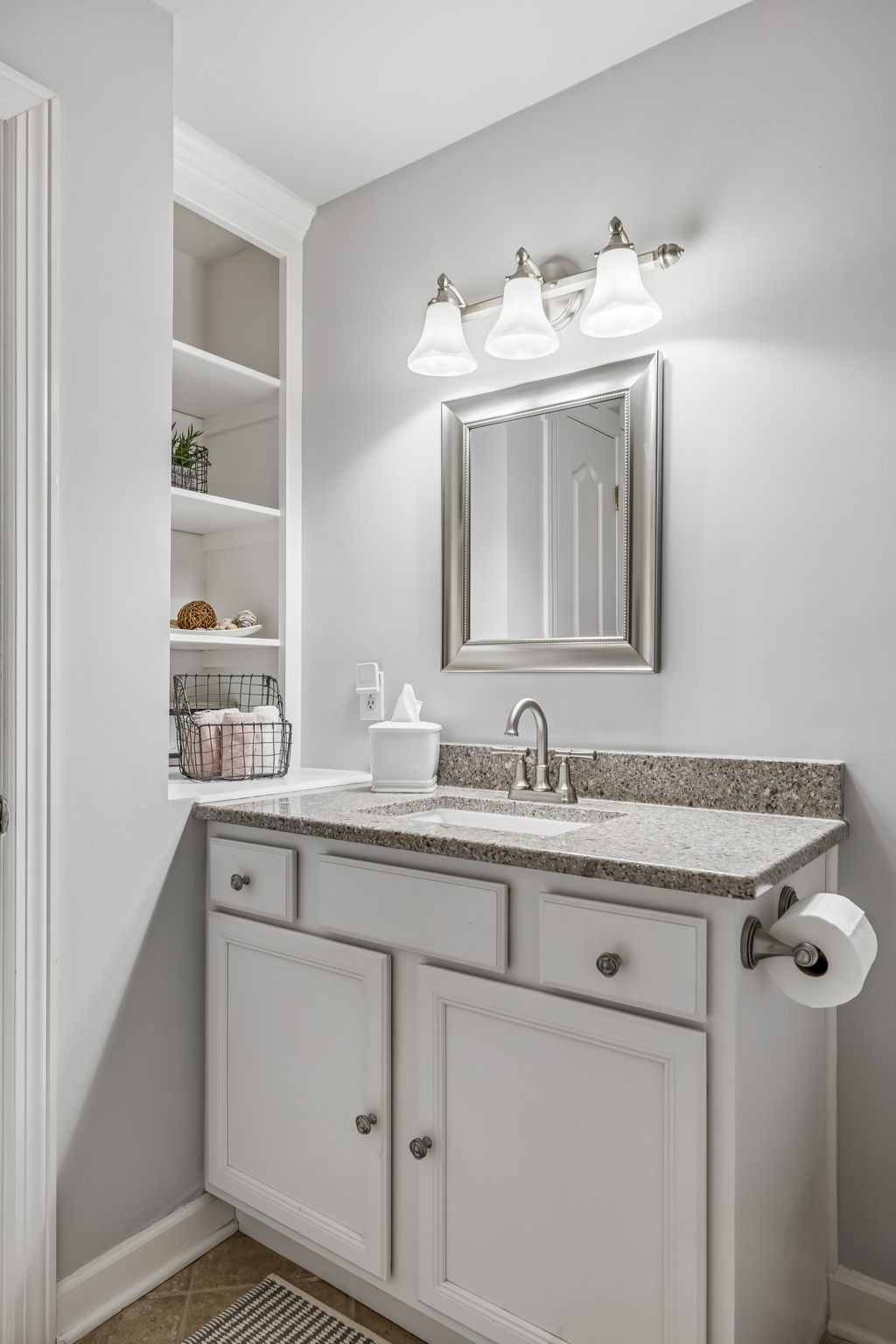 208 Landon Court Franklin, TN 37064 - Photo 29 of 58 a bathroom with a sink and a mirror