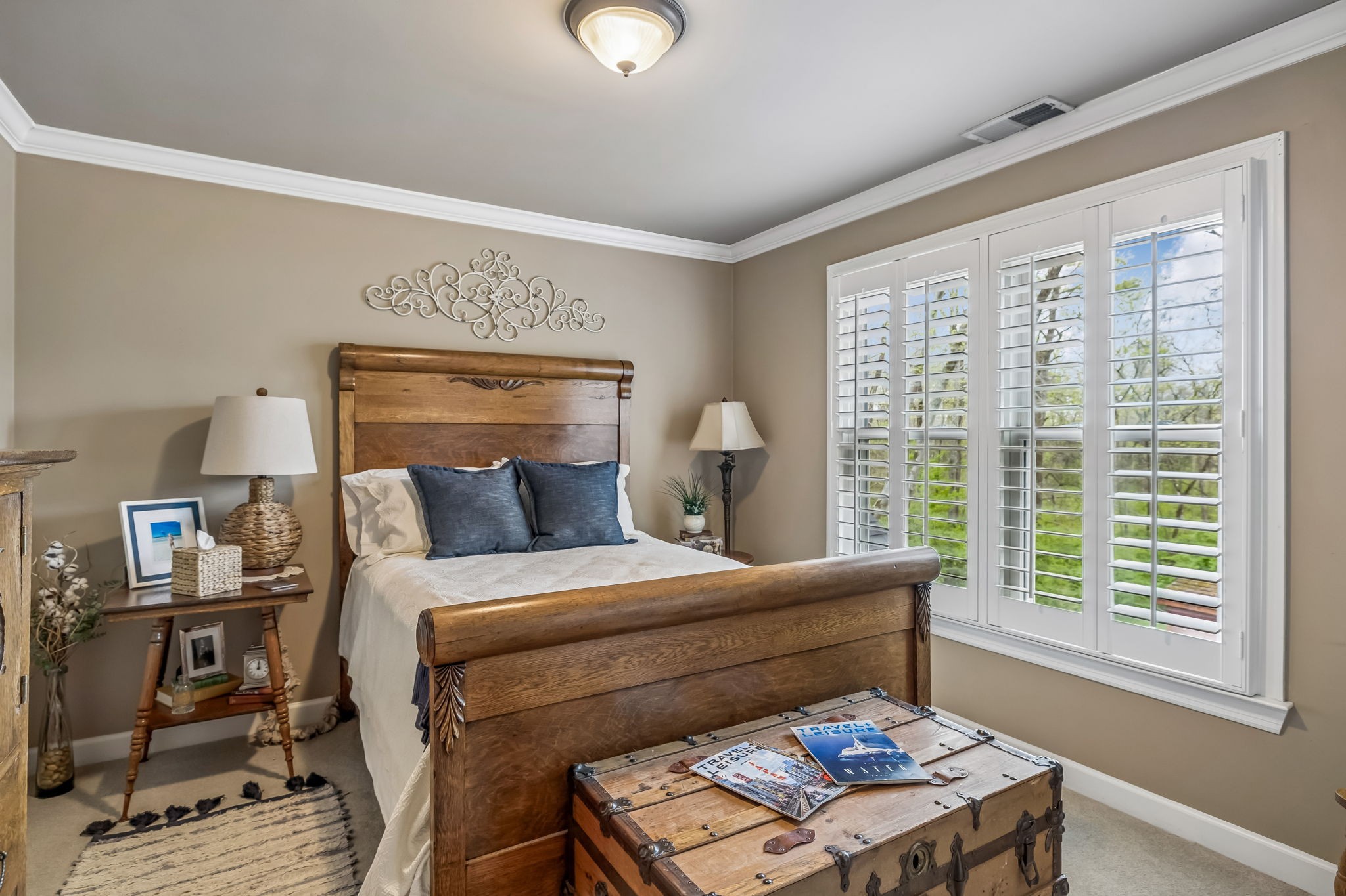 208 Landon Court Franklin, TN 37064 - Photo 31 of 58 a bedroom with a bed and wooden floor