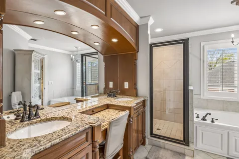 a bathroom with a shower and a sink