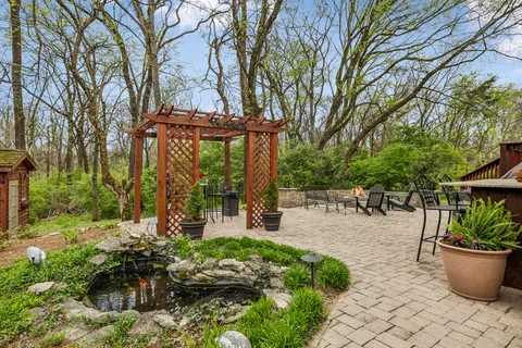 a view of a chairs and table in the deck