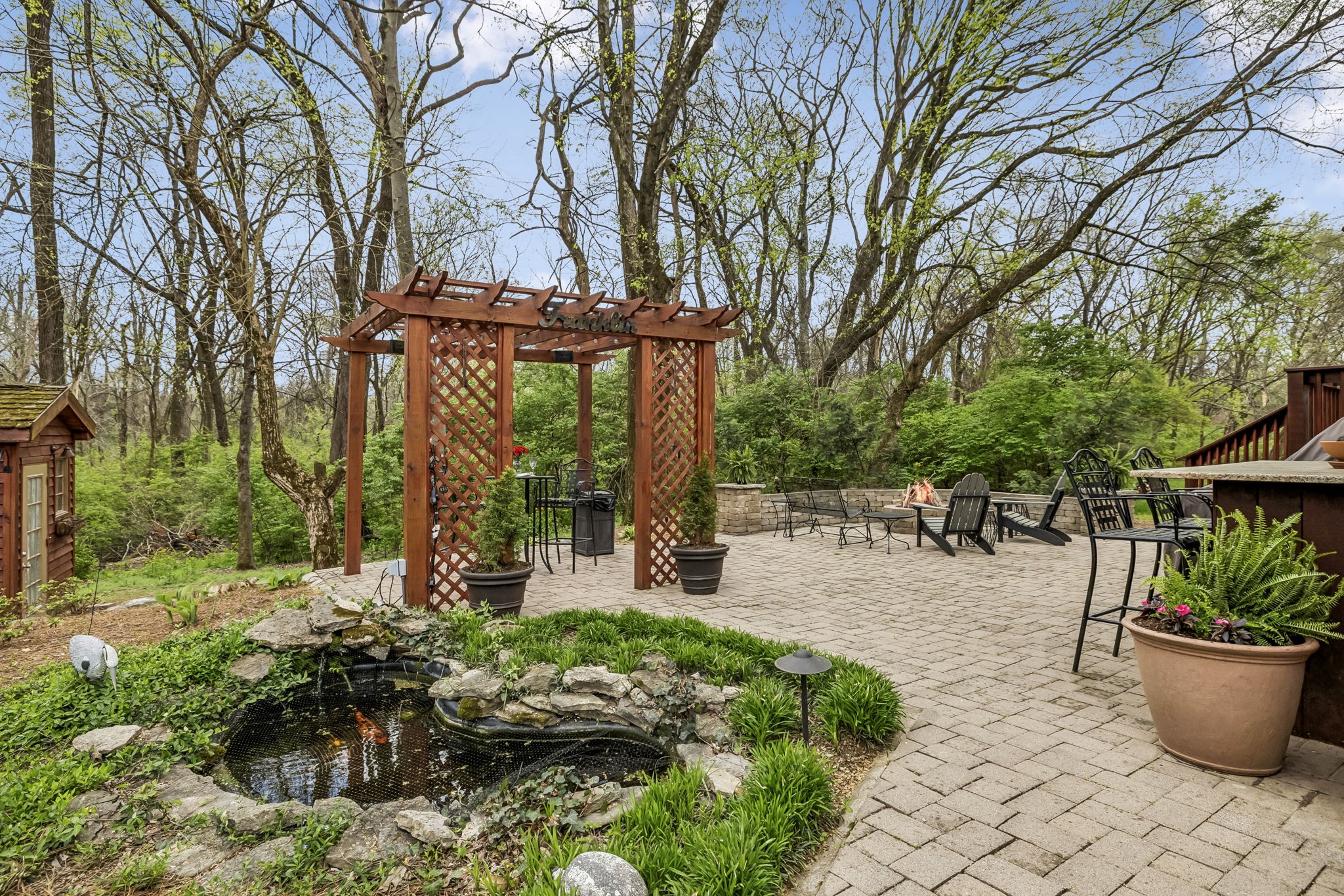 208 Landon Court Franklin, TN 37064 - Photo 41 of 58 a view of a backyard with sitting area and garden