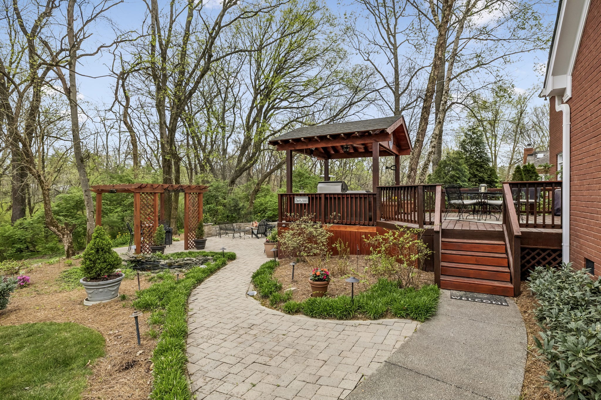208 Landon Court Franklin, TN 37064 - Photo 42 of 58 a view of a garden with pathway