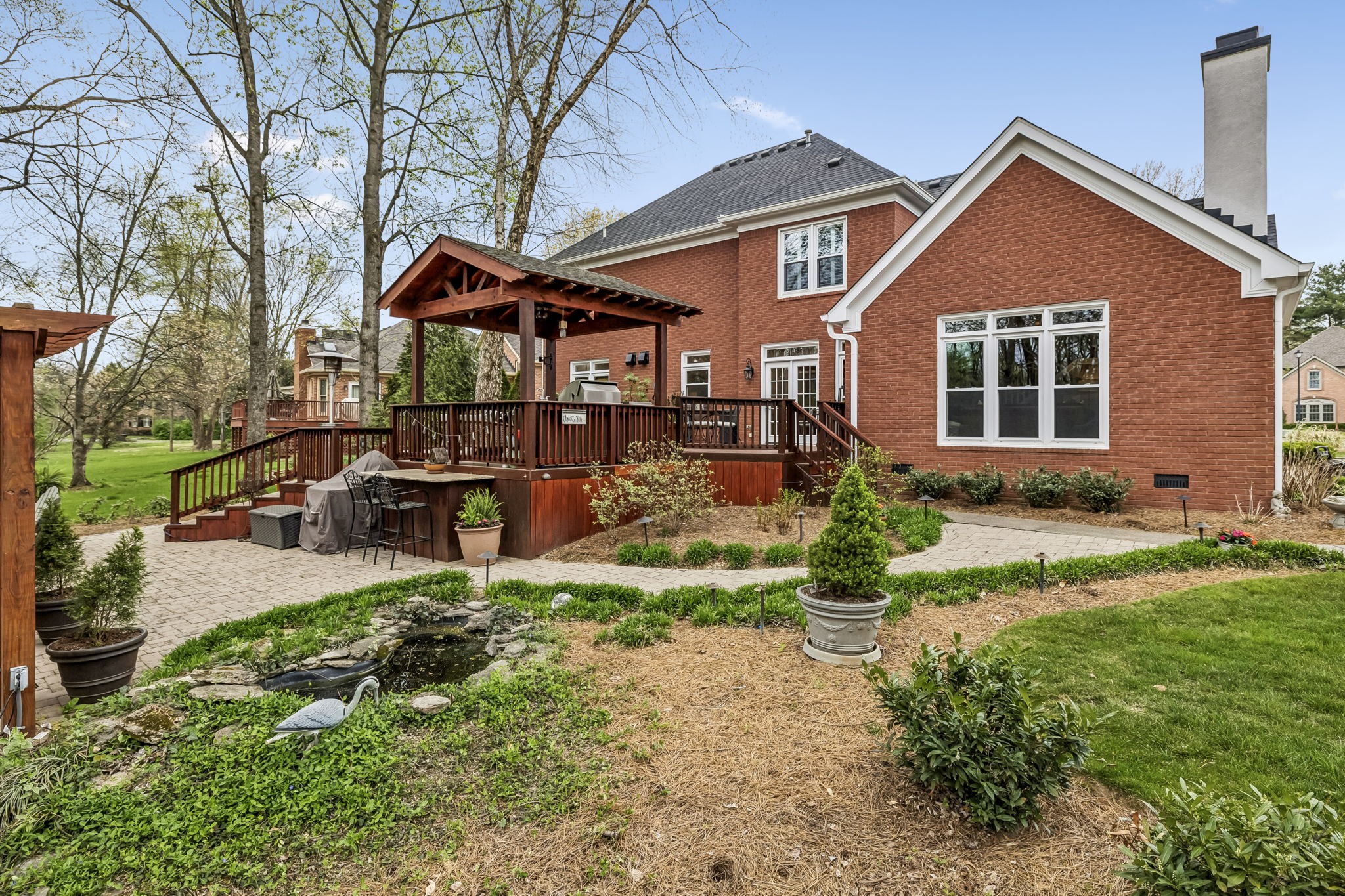208 Landon Court Franklin, TN 37064 - Photo 43 of 58 a front view of a house with garden