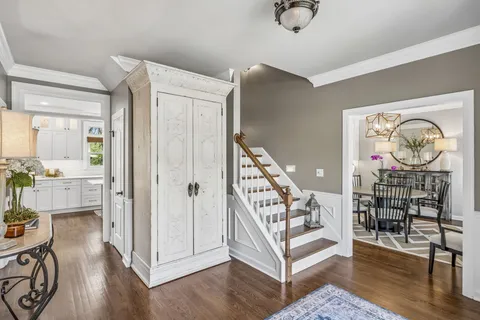a view of an entryway with wooden floor