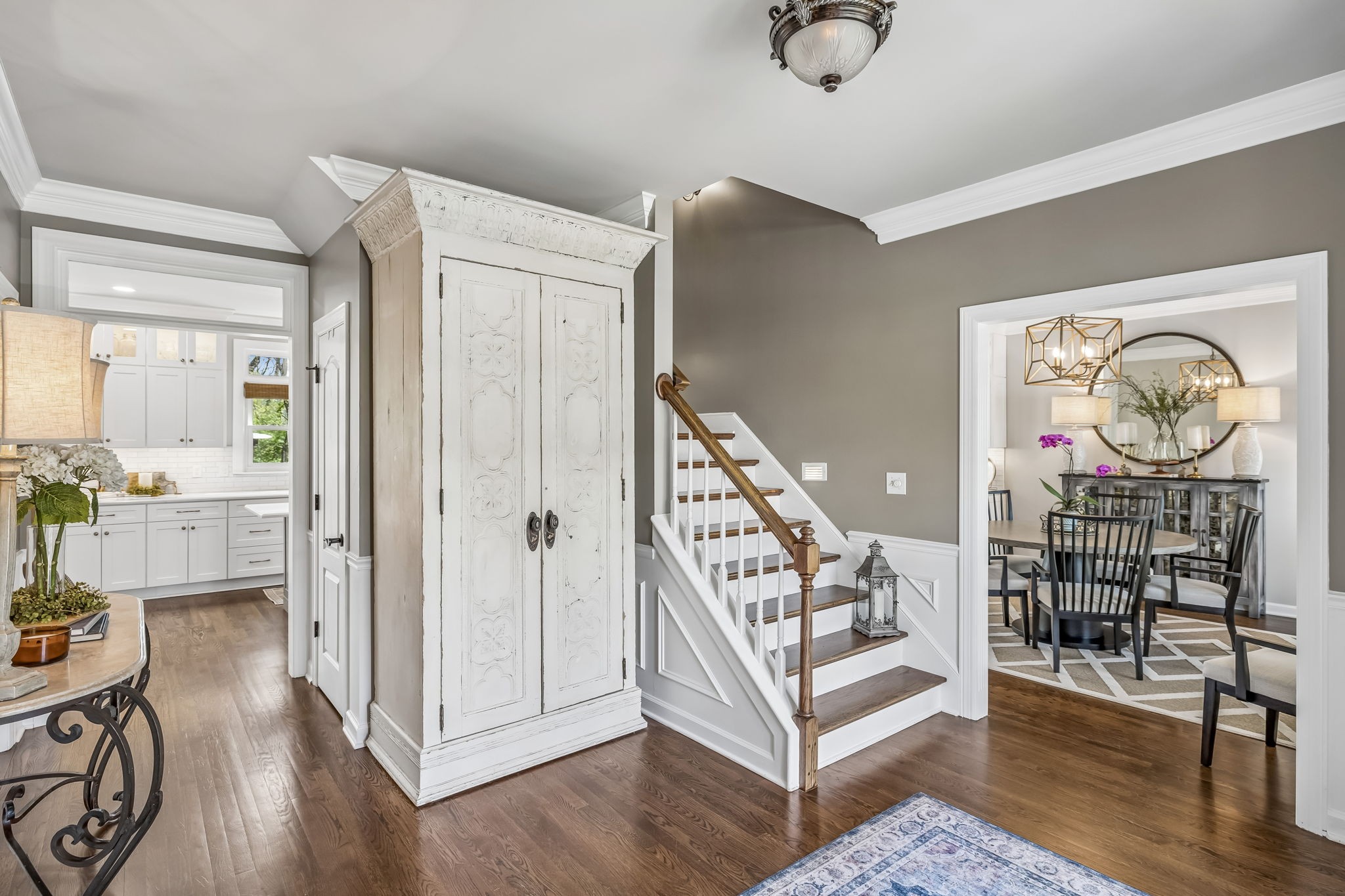 208 Landon Court Franklin, TN 37064 - Photo 5 of 58 a view of a hallway with dining area