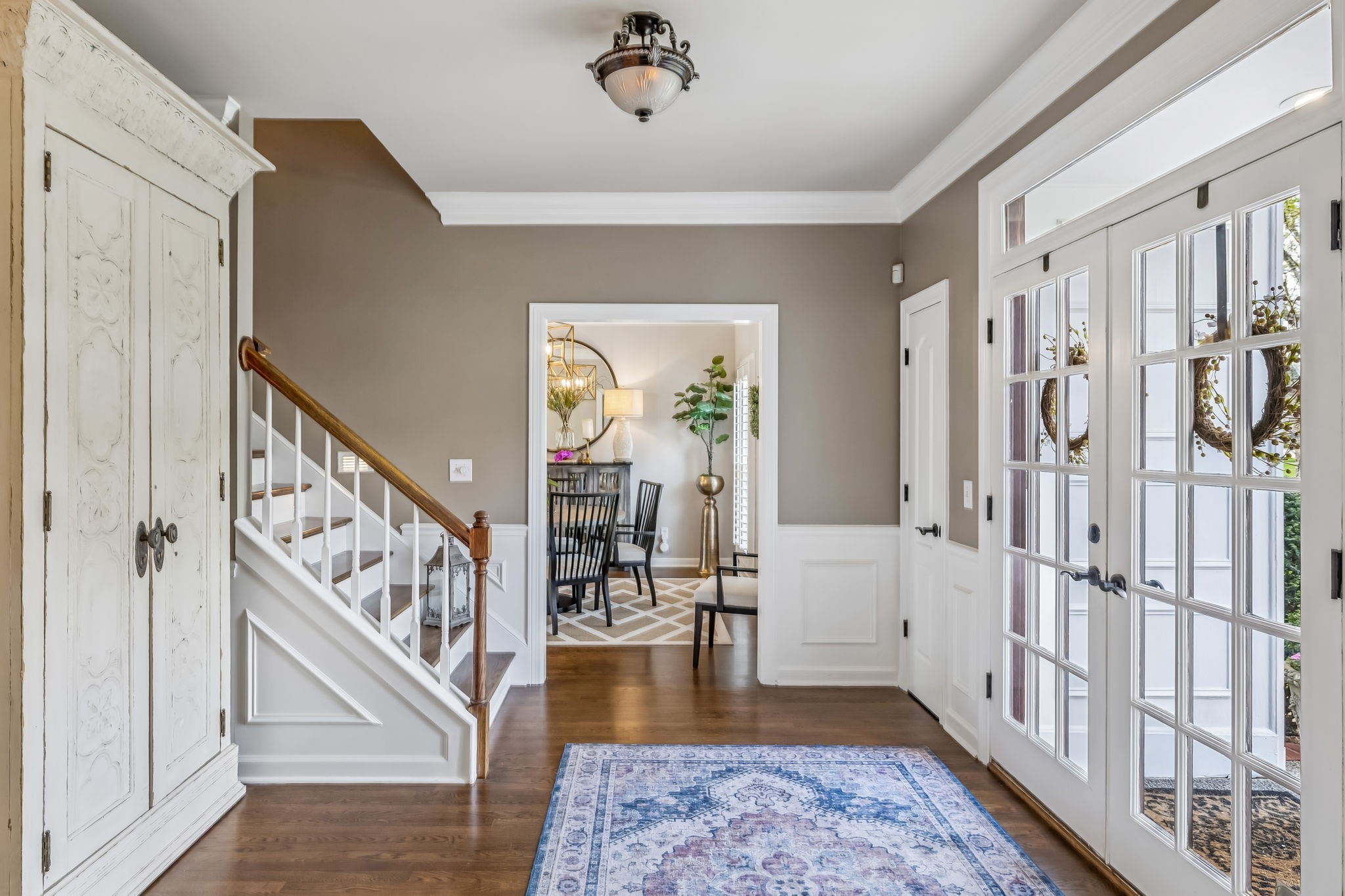 208 Landon Court Franklin, TN 37064 - Photo 7 of 58 a view of an entryway with wooden floor and a livingroom