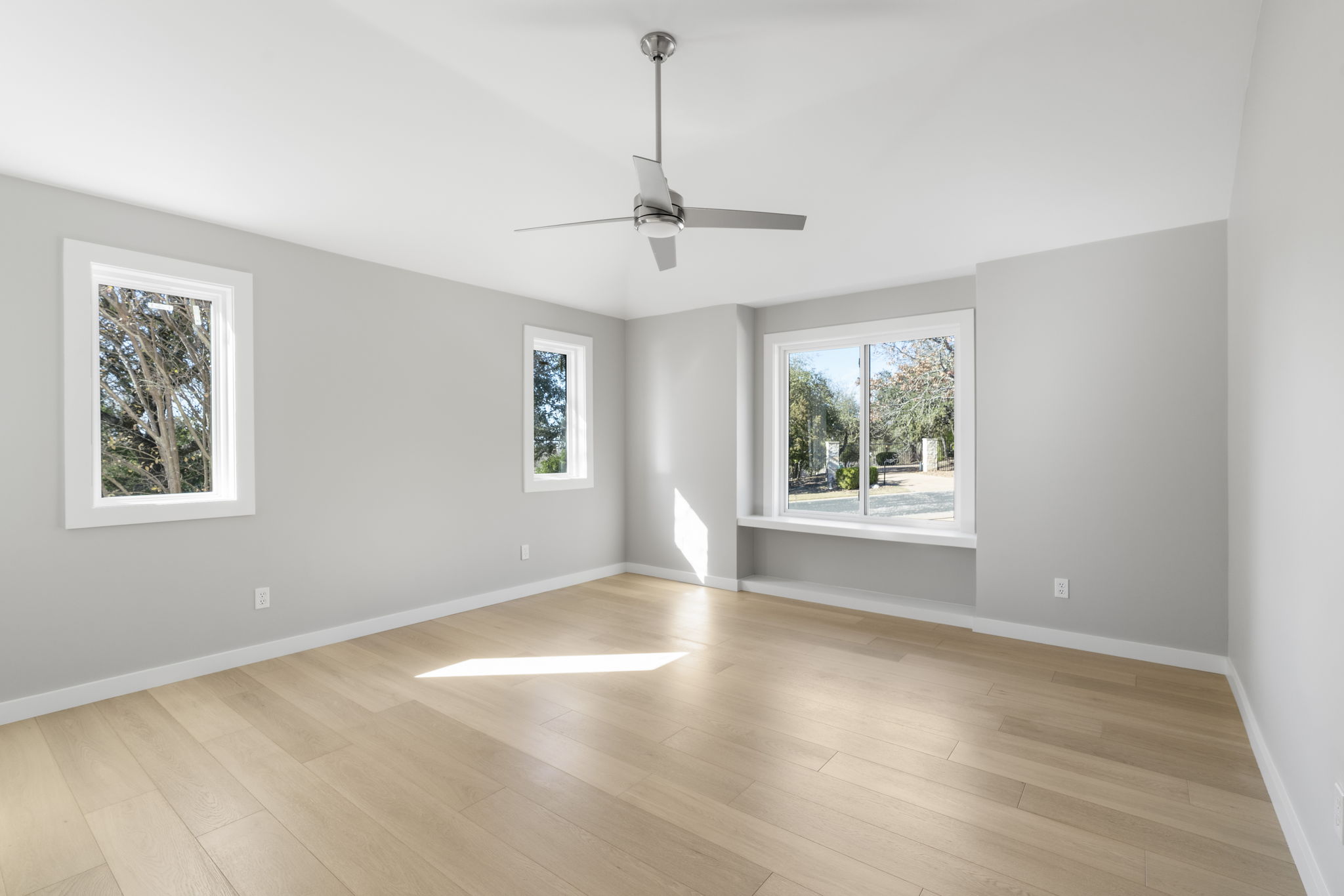 701 Furlong Drive Austin, TX 78746 - Photo 27 of 40 a view of an empty room with a window