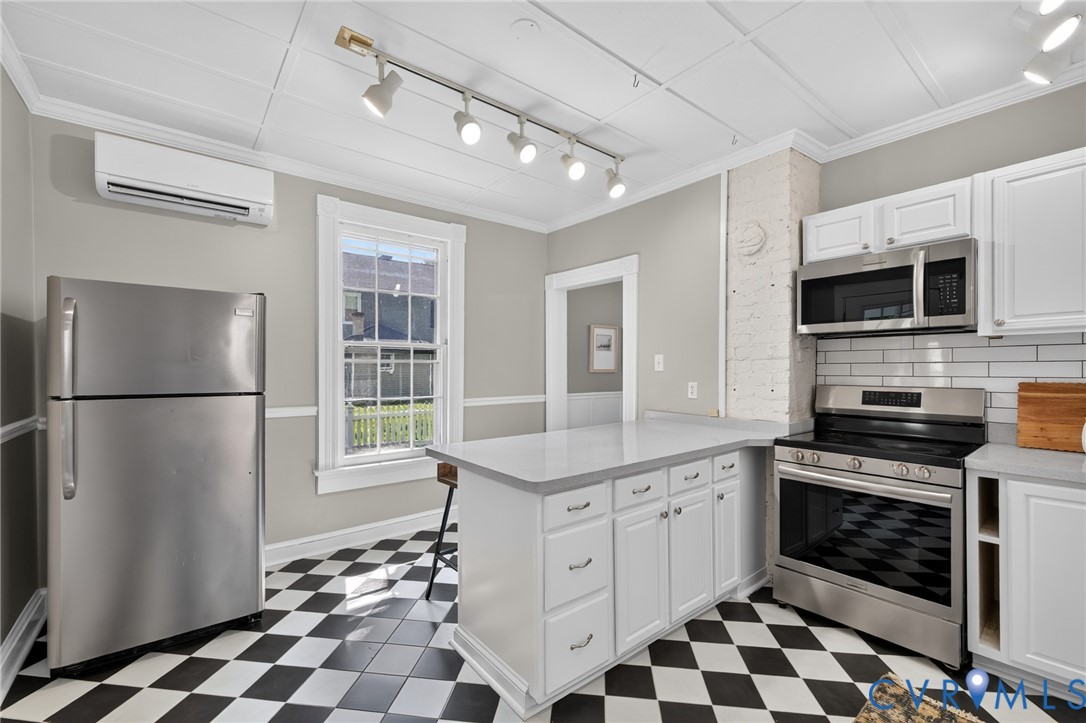 210 Henry Clay Road Ashland, VA 23005 - Photo 13 of 59 Kitchen featuring checkerboard flooring, a center