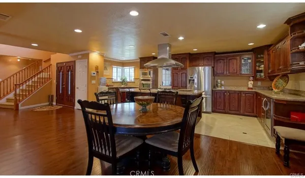 a view of a dining room with furniture
