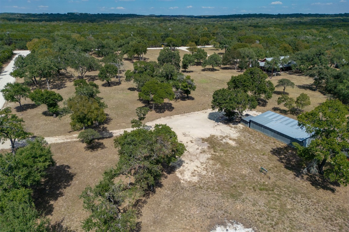 1301 Sandy Point Road Wimberley, TX 78676 - Photo 2 of 25 an aerial view of lake houses with outdoor space