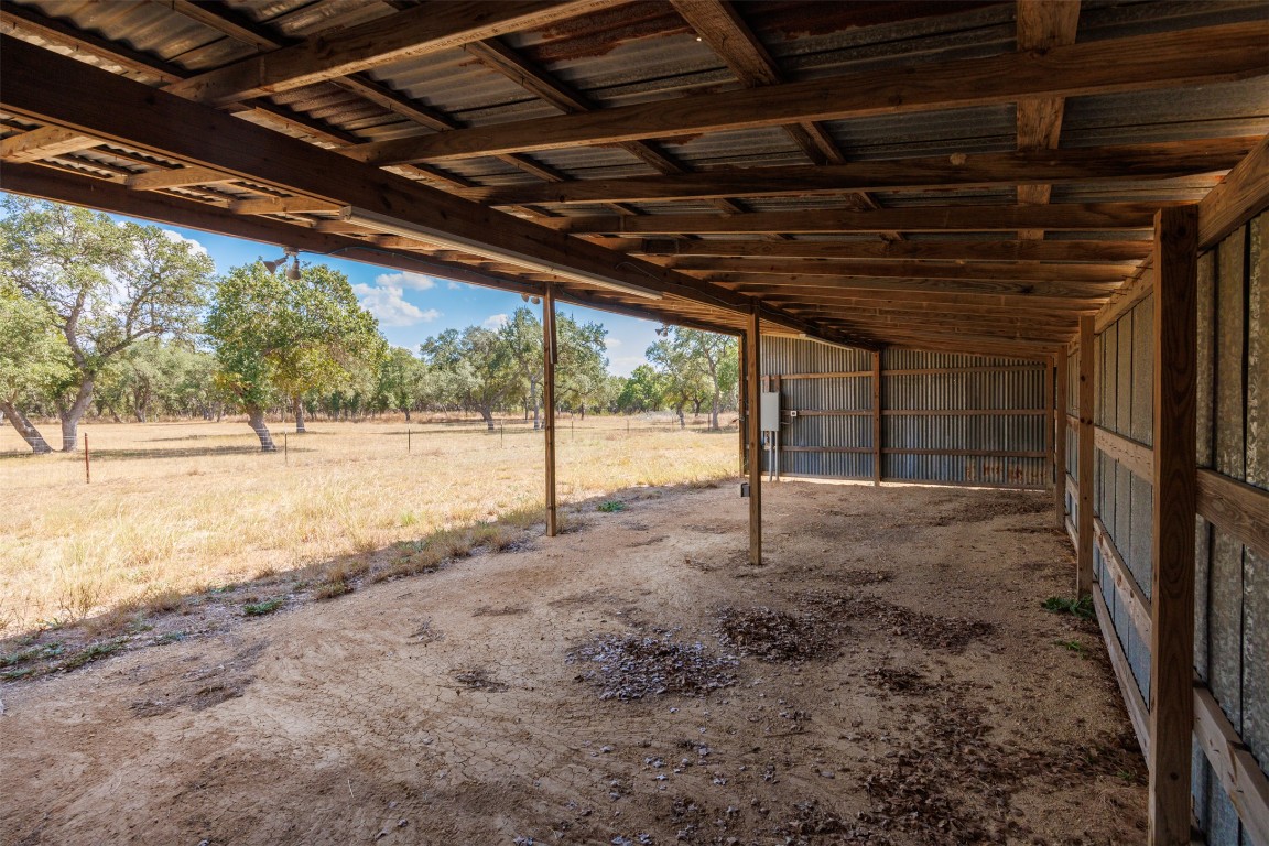 1301 Sandy Point Road Wimberley, TX 78676 - Photo 25 of 25 a view of a room with wooden walls