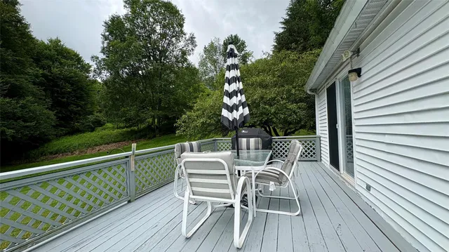 front view of a house with a big yard