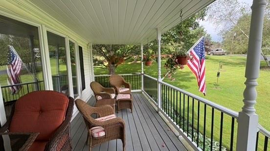 105 White Sulphur Road Swan Lake, NY 12783 - Photo 19 of 42 a view of a two chairs in the balcony