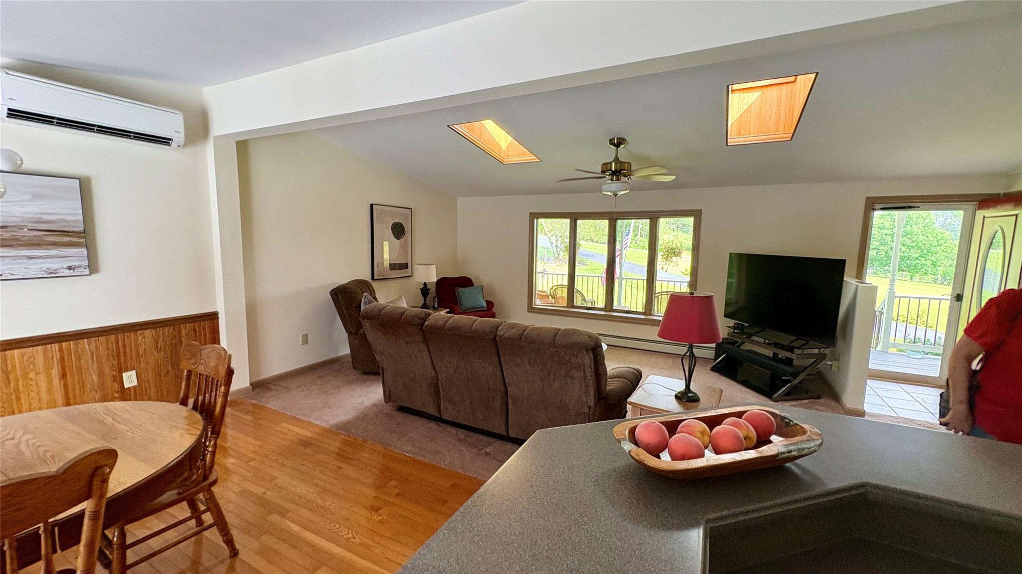 105 White Sulphur Road Swan Lake, NY 12783 - Photo 20 of 42 a living room with furniture and a flat screen tv