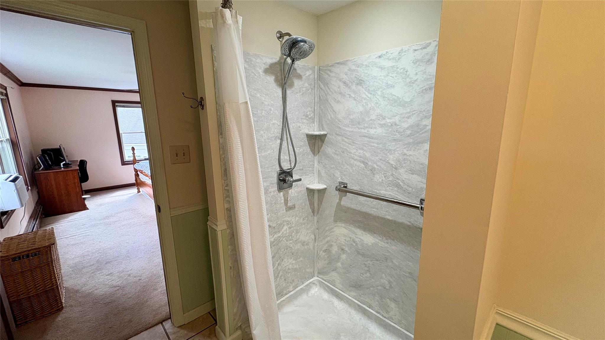 105 White Sulphur Road Swan Lake, NY 12783 - Photo 31 of 42 a bathroom with a glass shower door