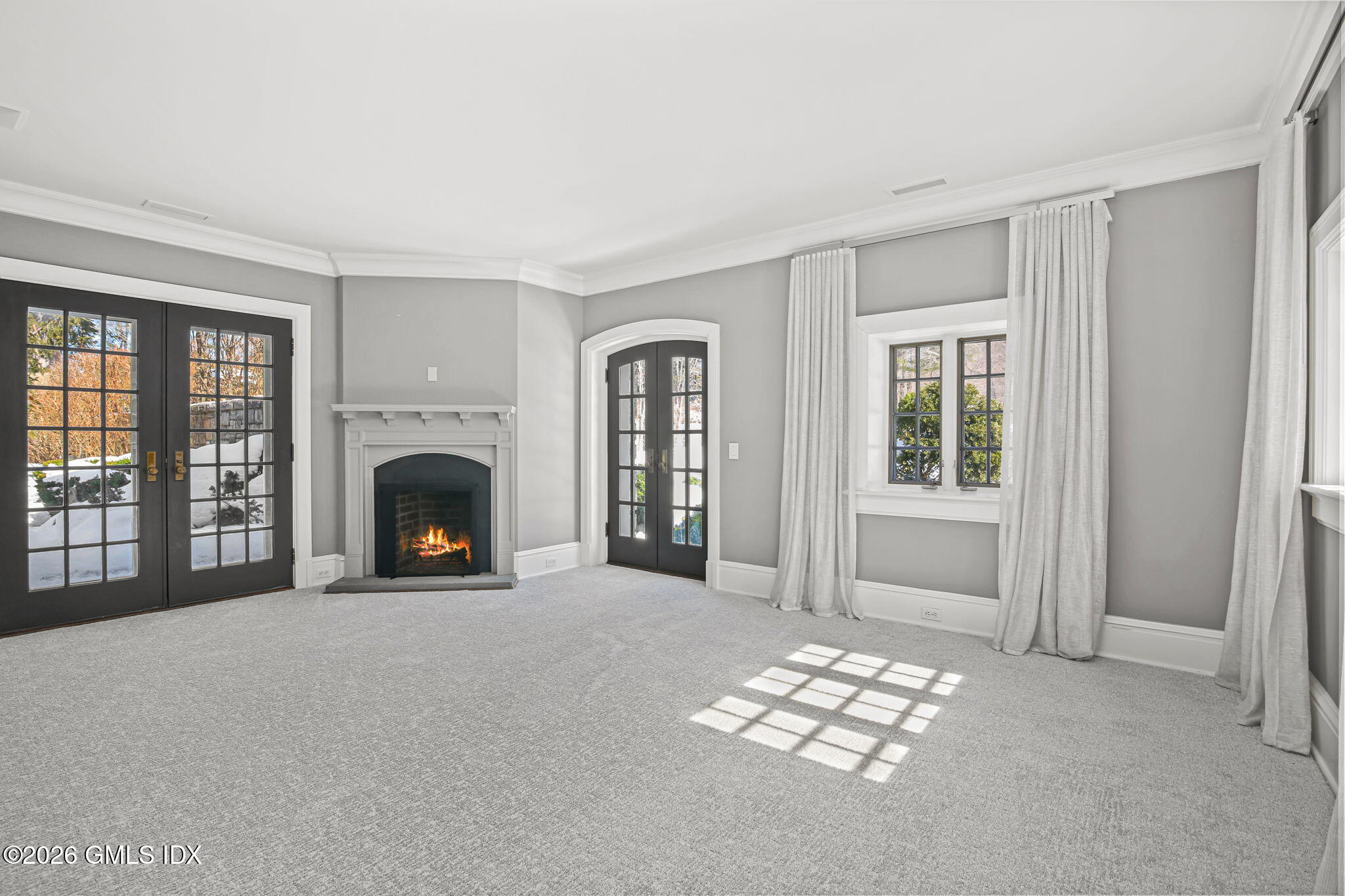 164 Round Hill Road Greenwich, CT 06831 - Photo 51 of 67 a view of livingroom with furniture fireplace and window
