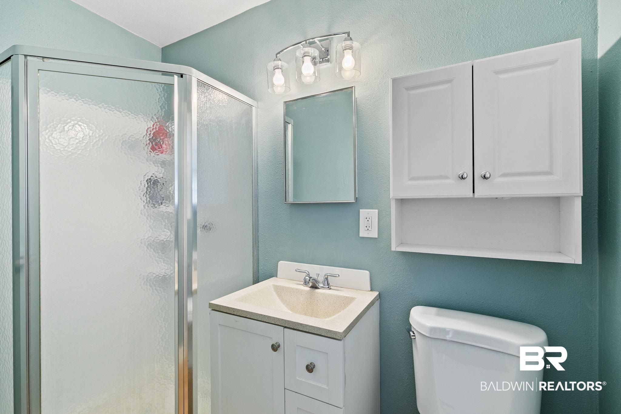 14 Lee Circle Daphne, AL 36527 - Photo 39 of 83 Bathroom with a shower with shower door, toilet, and large vanity