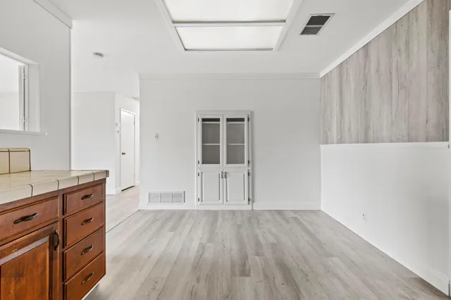 a kitchen with stainless steel appliances granite countertop a stove and a sink