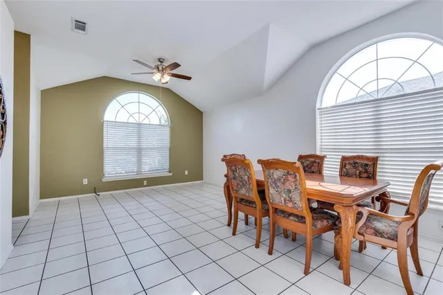 a view of a livingroom with furniture and window