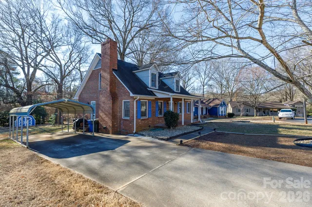 a view of a house with a snow in front of house
