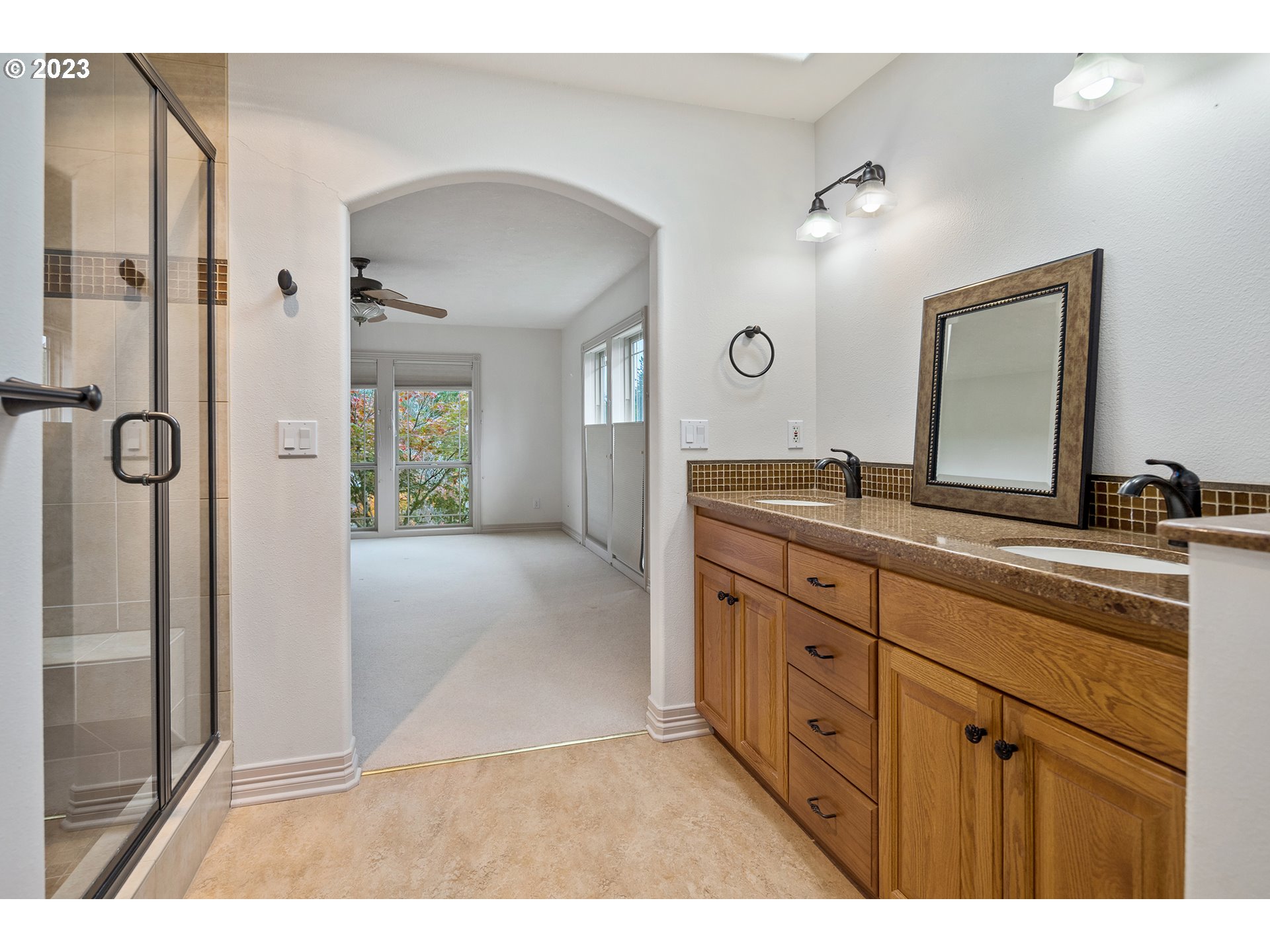 1236 Southeast 26th Drive Gresham, OR 97080 - Photo 28 of 48 a bathroom with a granite countertop sink mirror and a