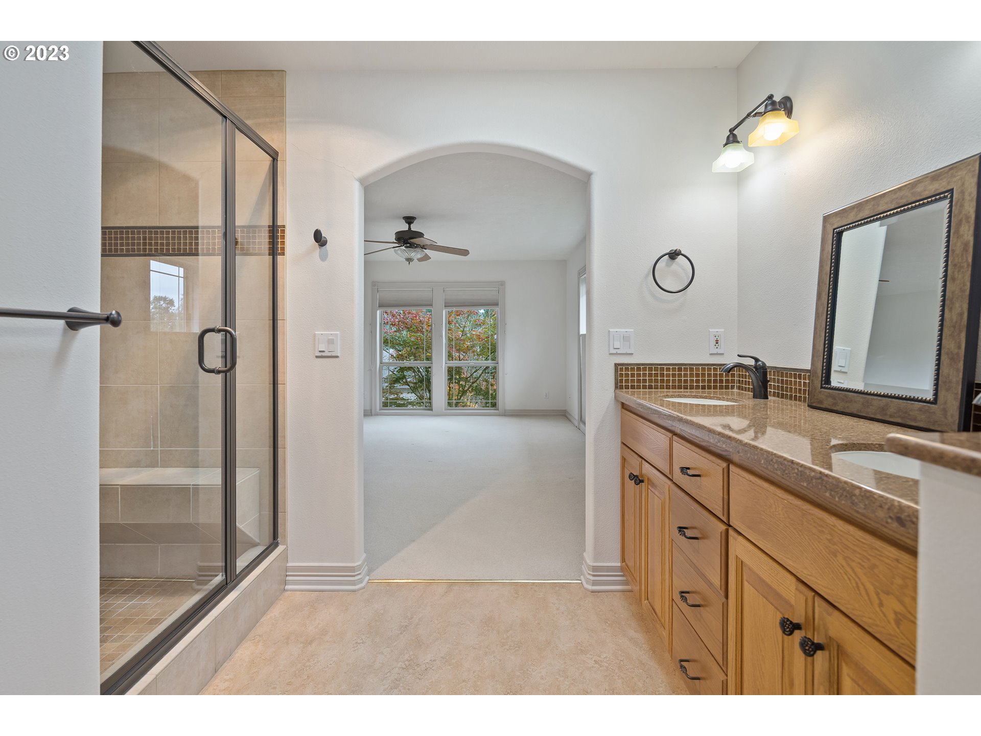 1236 Southeast 26th Drive Gresham, OR 97080 - Photo 29 of 48 a bathroom with a granite countertop sink mirror and shower