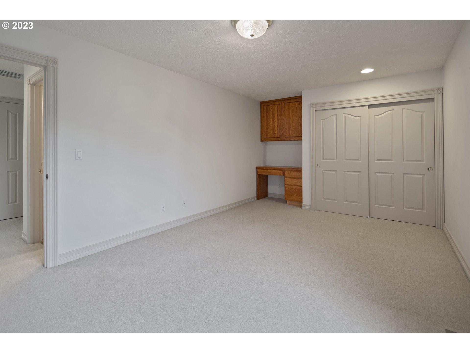 1236 Southeast 26th Drive Gresham, OR 97080 - Photo 32 of 48 a view of an empty room with a cabinet