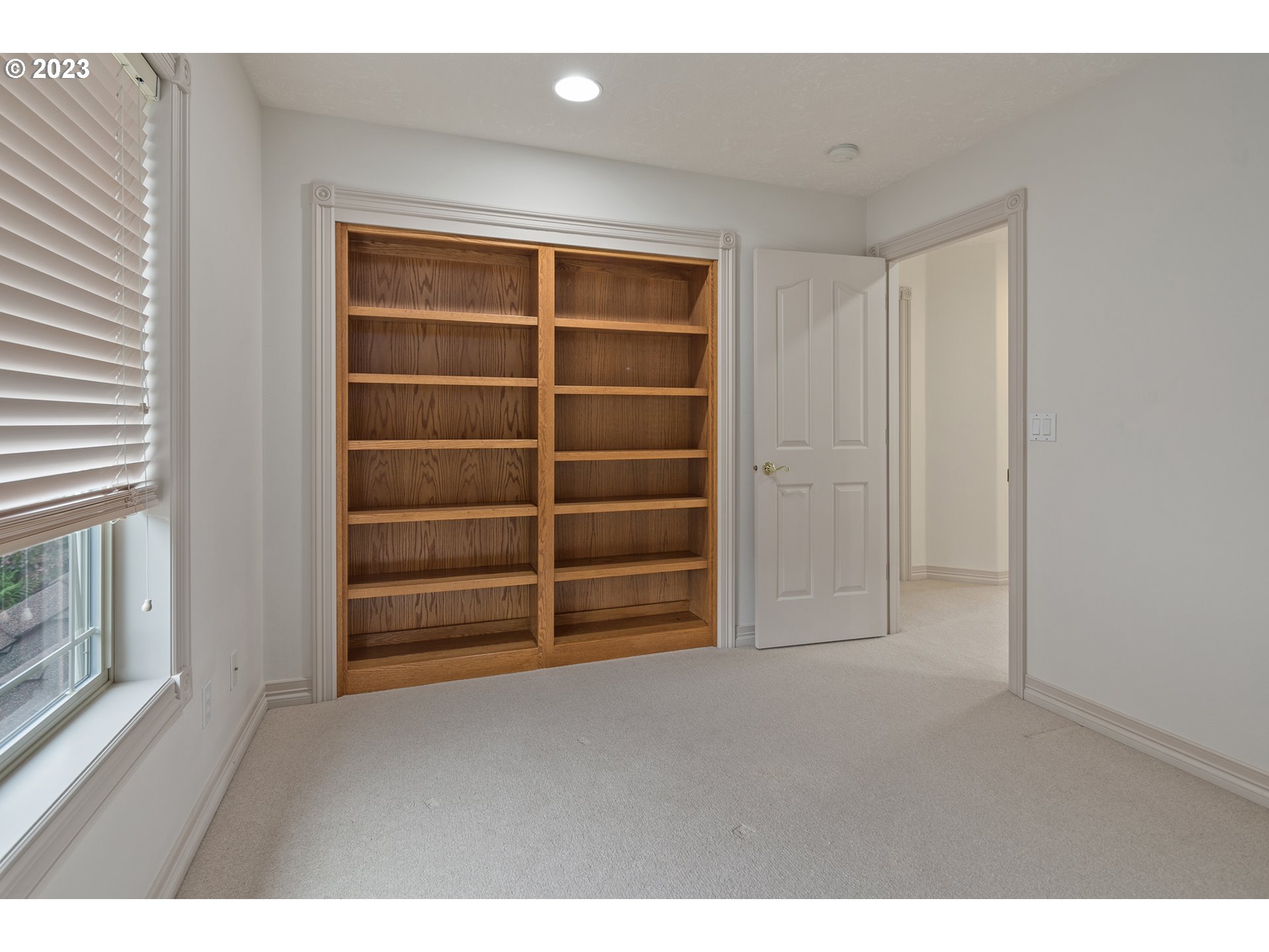 1236 Southeast 26th Drive Gresham, OR 97080 - Photo 34 of 48 a view of an empty room with a fireplace and a window