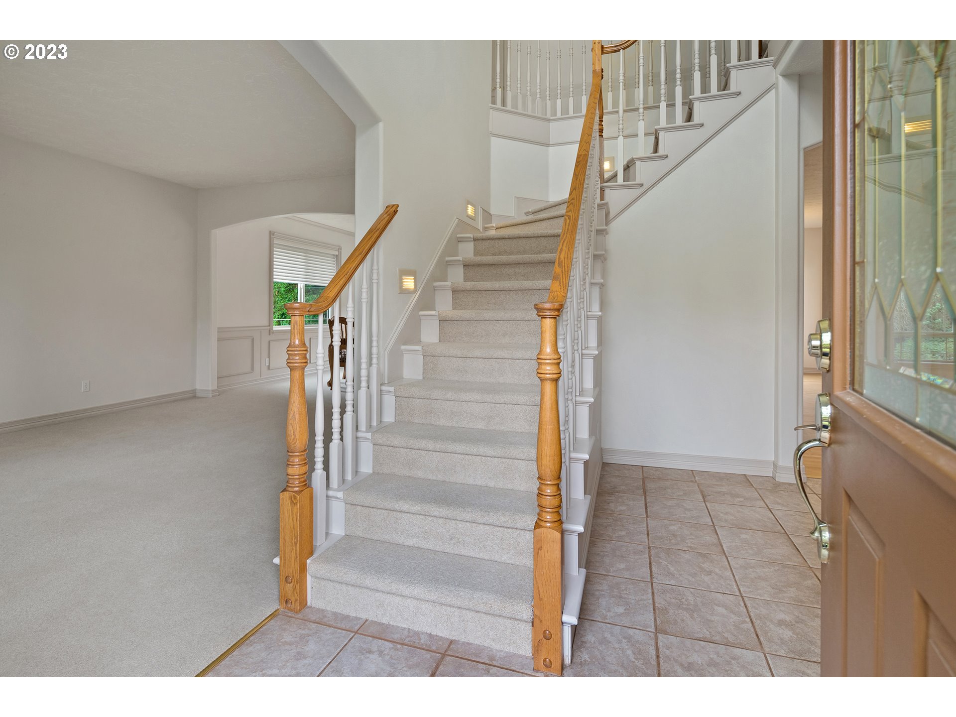 1236 Southeast 26th Drive Gresham, OR 97080 - Photo 4 of 48 a view of entryway and hall with wooden floor