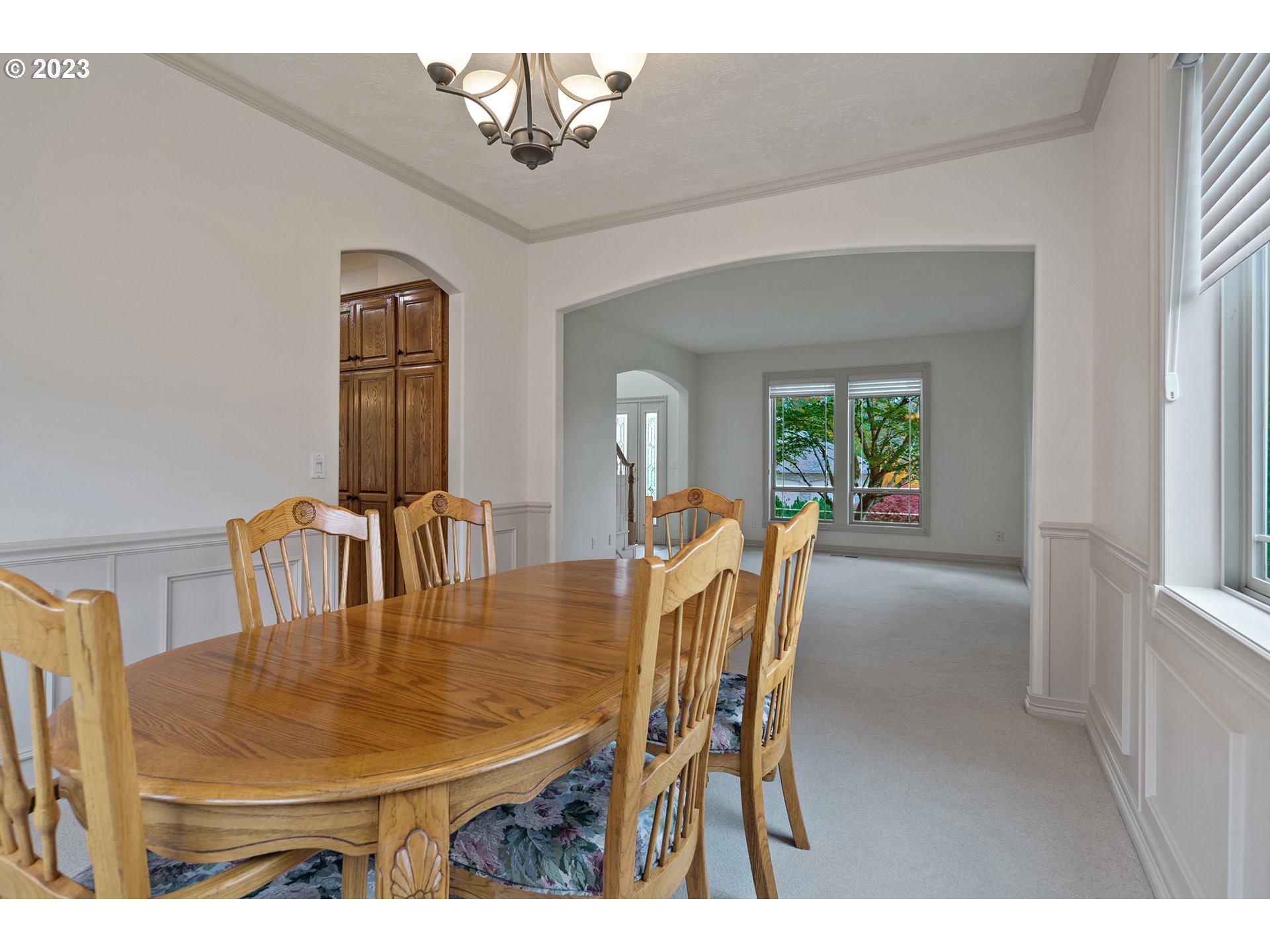 1236 Southeast 26th Drive Gresham, OR 97080 - Photo 9 of 48 a view of a dining room with furniture and a chandelier