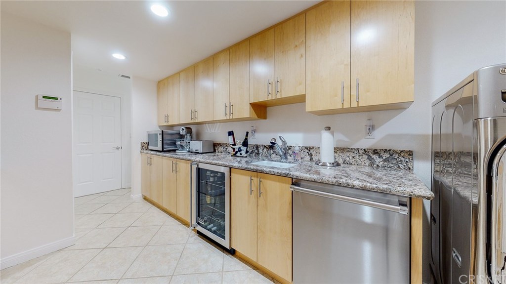 26127 Millstream Drive Canyon Country, CA 91387 - Photo 35 of 68 Butlers Pantry / Laundry Room