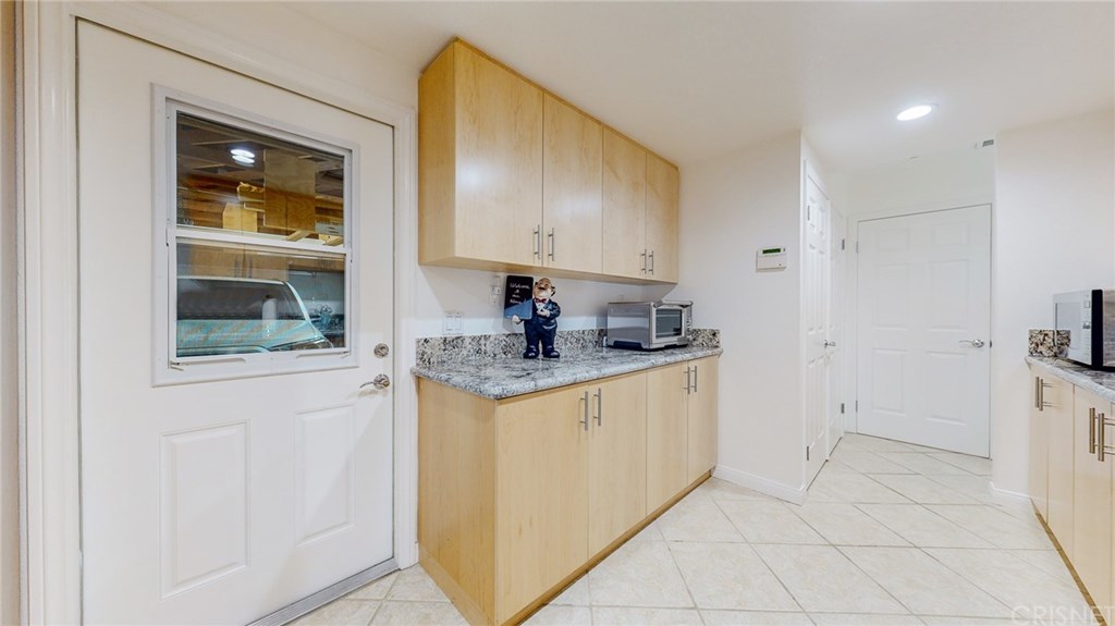 26127 Millstream Drive Canyon Country, CA 91387 - Photo 36 of 68 Butlers Pantry / Door into Garage