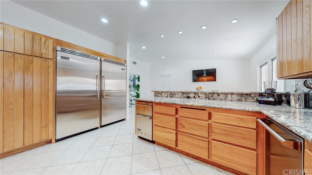 26127 Millstream Drive Canyon Country, CA 91387 - Photo 9 of 68 Full 36" Viking refrigerator, alongside full 36" Viking Freezer