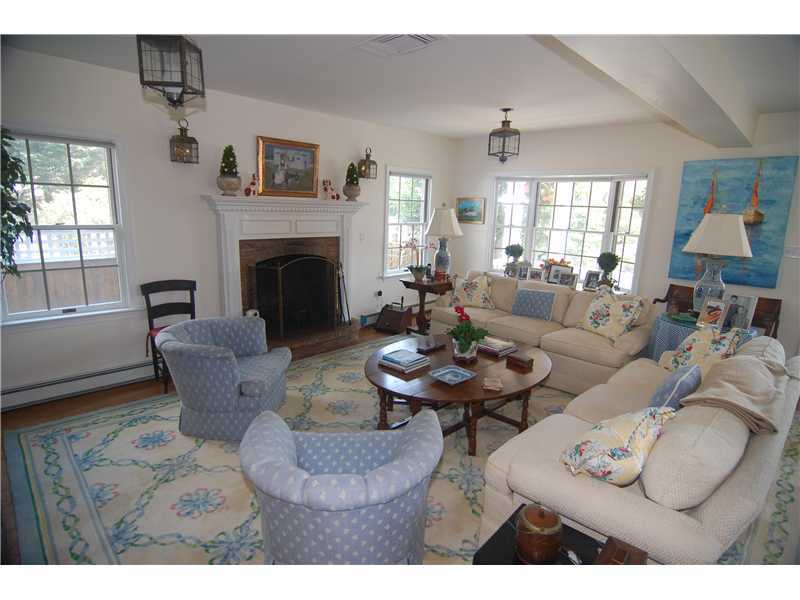 3 Yarmouth Road Rowayton, CT 06853 - Photo 5 of 15 a living room with furniture and a fireplace