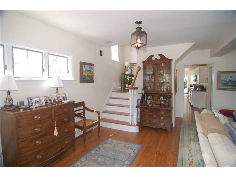 3 Yarmouth Road Rowayton, CT 06853 - Photo 6 of 15 a living room with furniture and wooden floor
