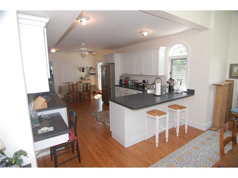 3 Yarmouth Road Rowayton, CT 06853 - Photo 10 of 15 a living room with furniture and a dining table