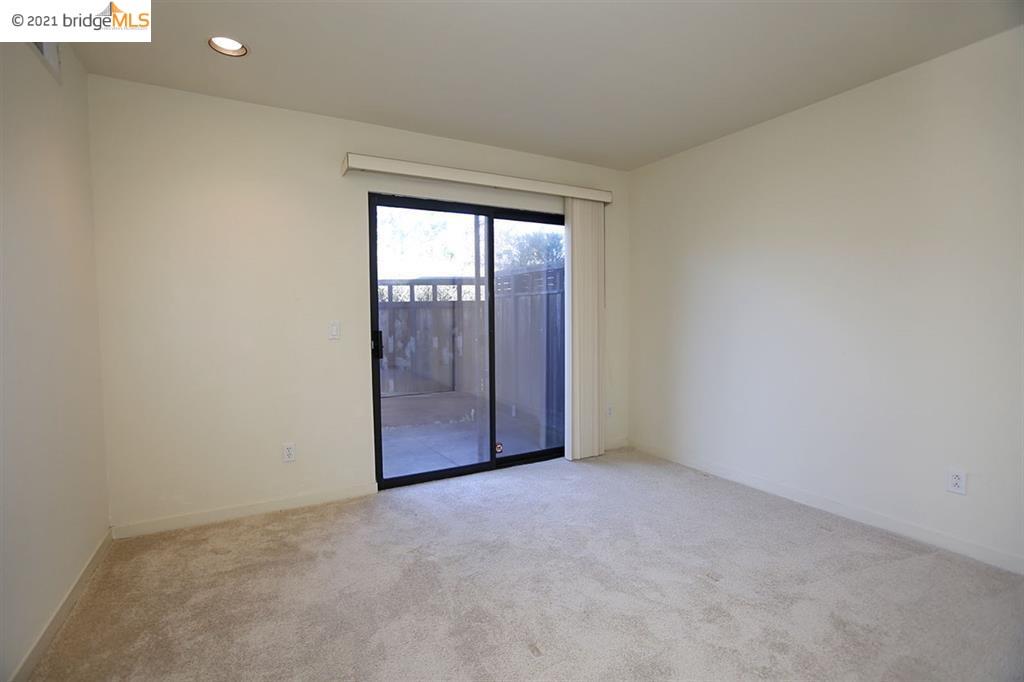 27 Windward Hill Oakland, CA 94618 - Photo 13 of 16 a view of an empty room with a window