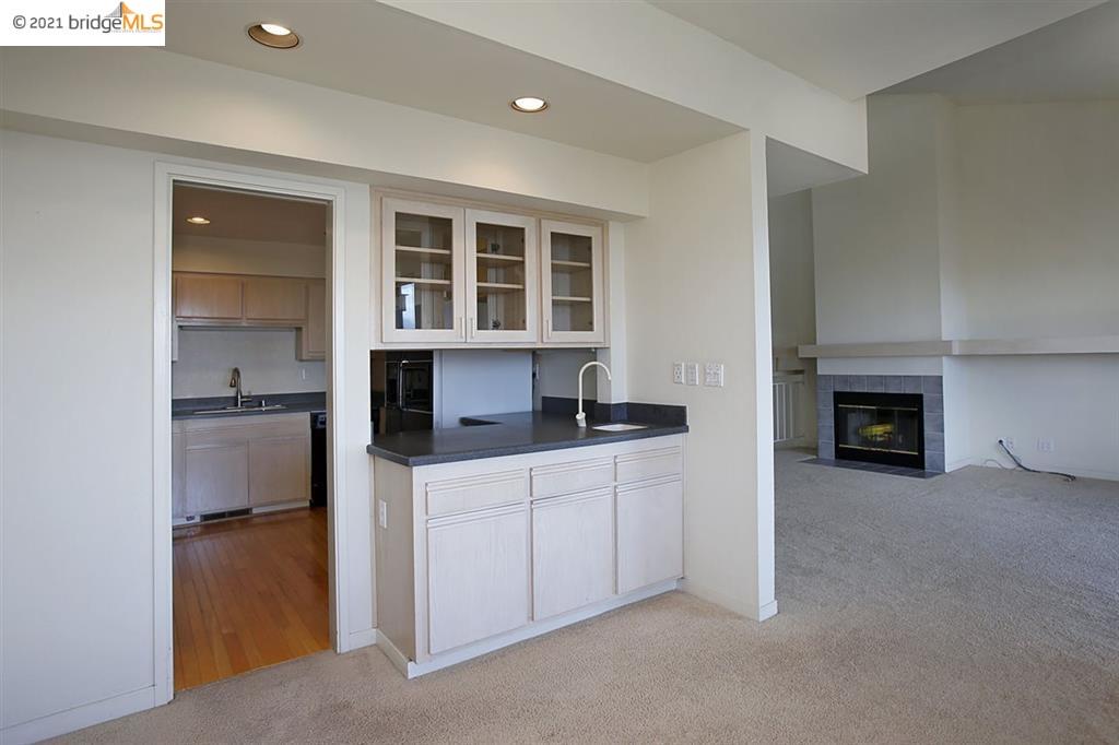 27 Windward Hill Oakland, CA 94618 - Photo 5 of 16 a kitchen with stainless steel appliances a sink stove and cabinets