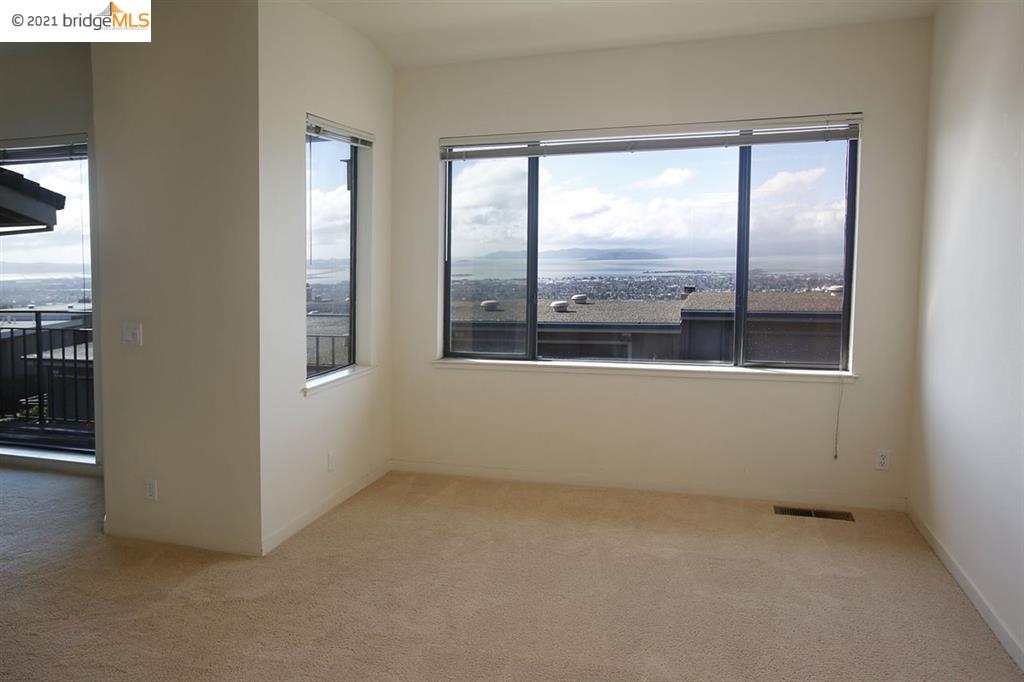 27 Windward Hill Oakland, CA 94618 - Photo 6 of 16 an empty room with window