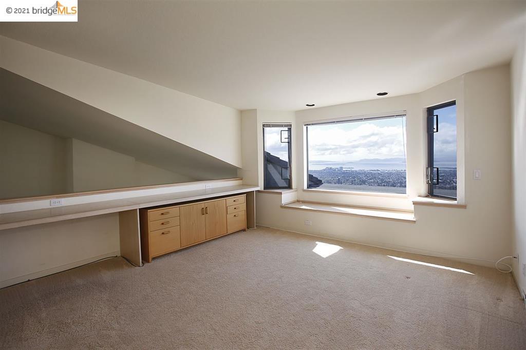 27 Windward Hill Oakland, CA 94618 - Photo 9 of 16 a view of an empty room with window