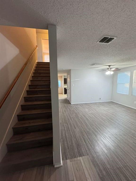 16516 Jasmine Springs Drive Fort Worth, TX 76247 - Photo 11 of 16 a view of entryway and hall with wooden floor