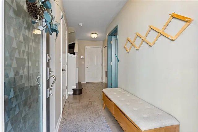 a bathroom with a tub and shower