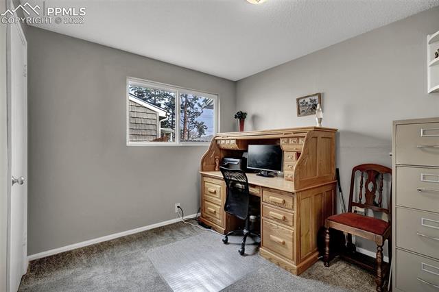 513 Huron Road Colorado Springs, CO 80910 - Photo 21 of 26 Bedroom 3; currently used as an office